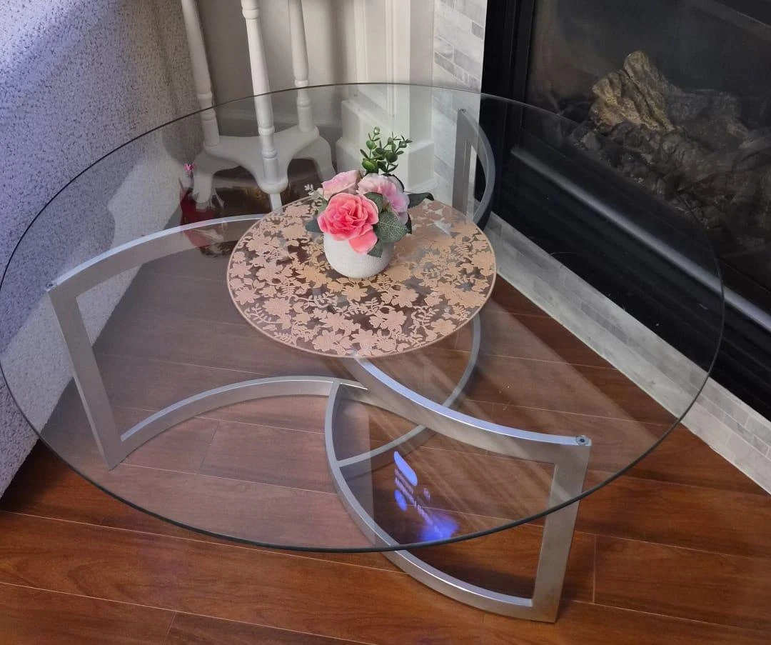 Glass coffee table with metal frame