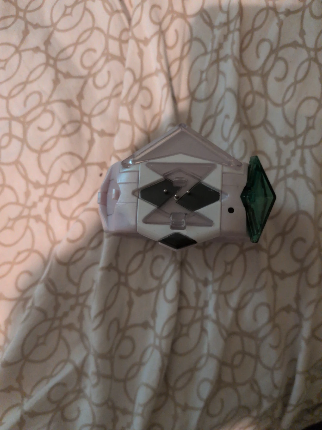 Pokemon z-ring toy from the pokemon sun era