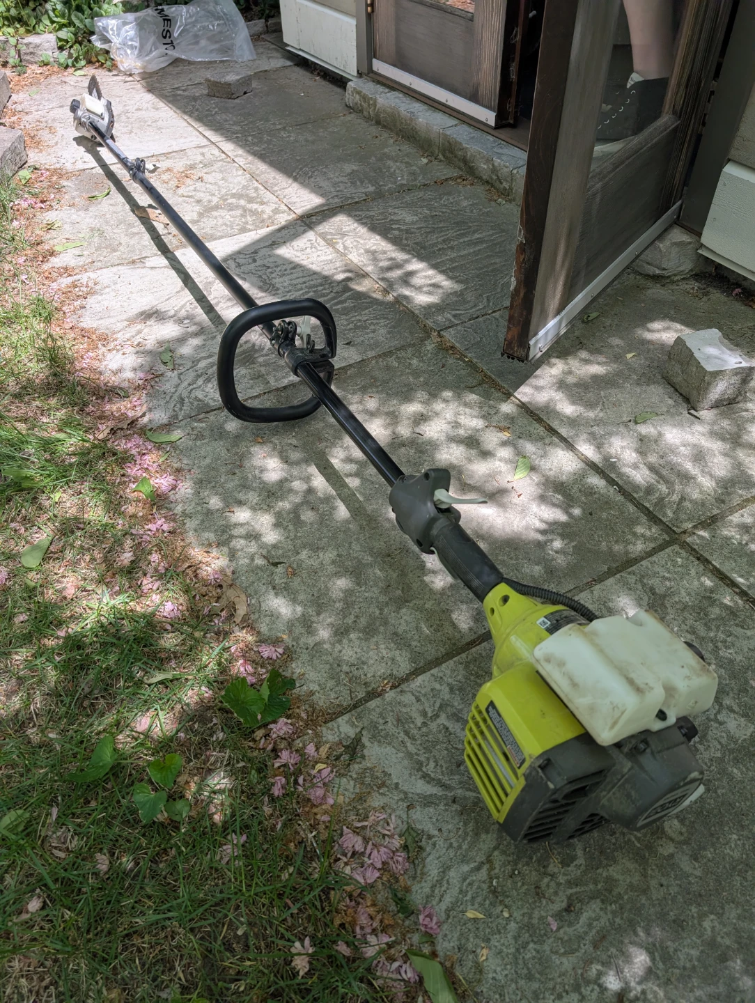 Ryobi Trimmer with Chainsaw Attachment