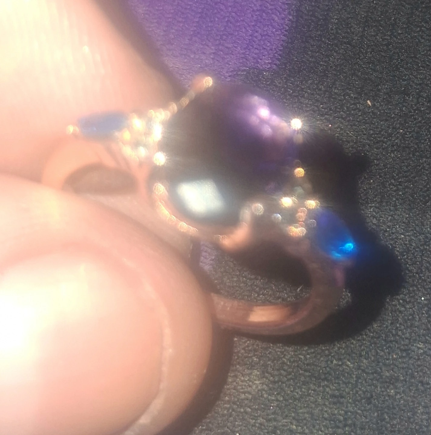 Purple Gemstone Ring with blue stones