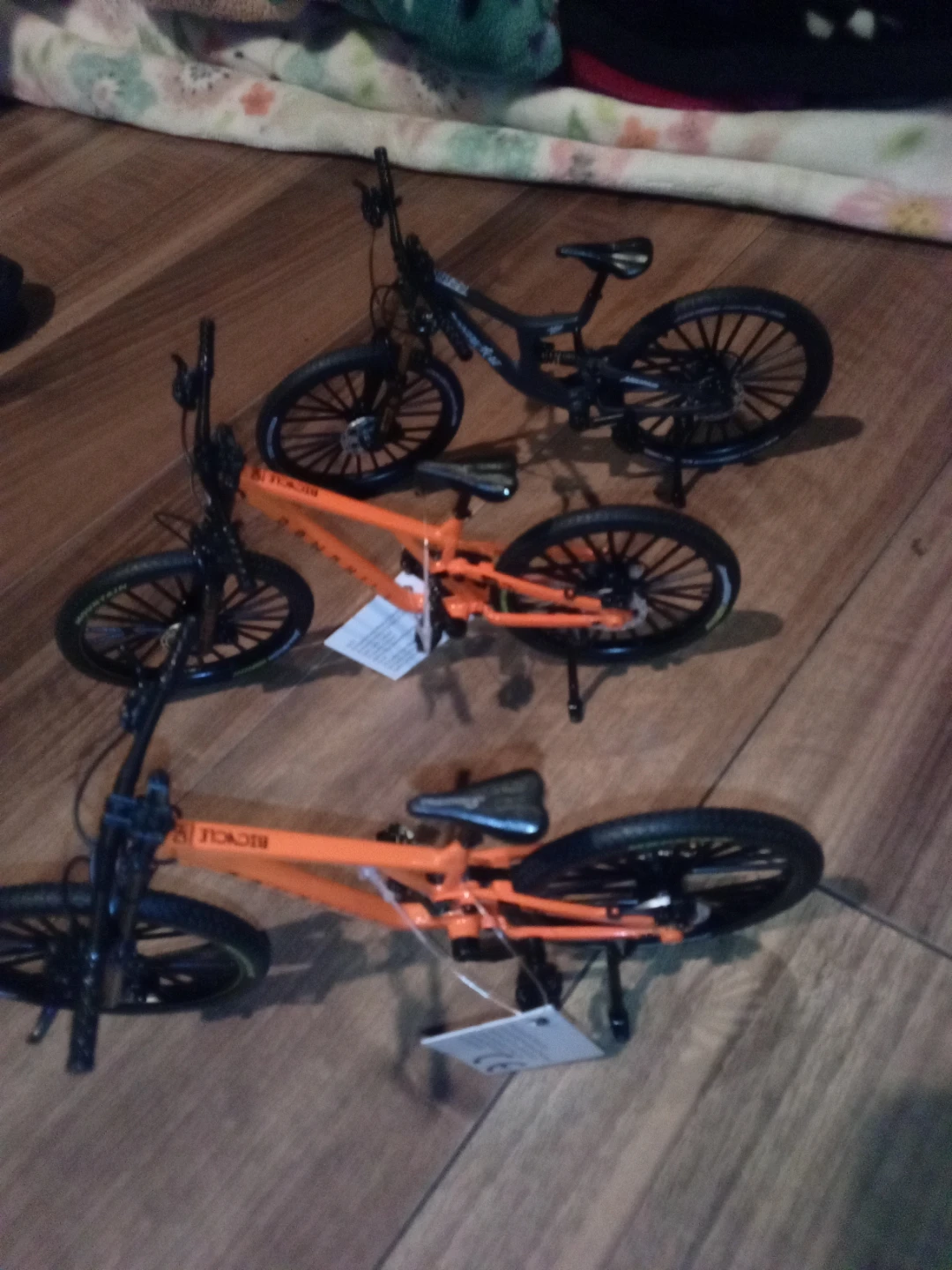 3 Miniature Mountain Bikes -2 Orange and1 Black