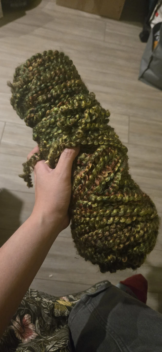 Green fuzzy yarn with warmer tones