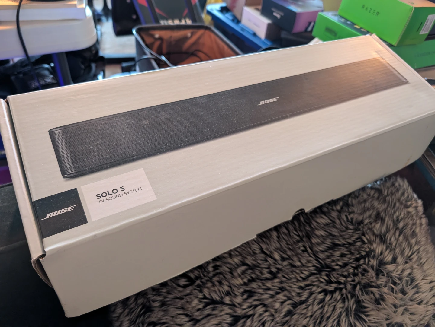 Bose Solo 5 TV Soundbar with Universal Remote Control and box