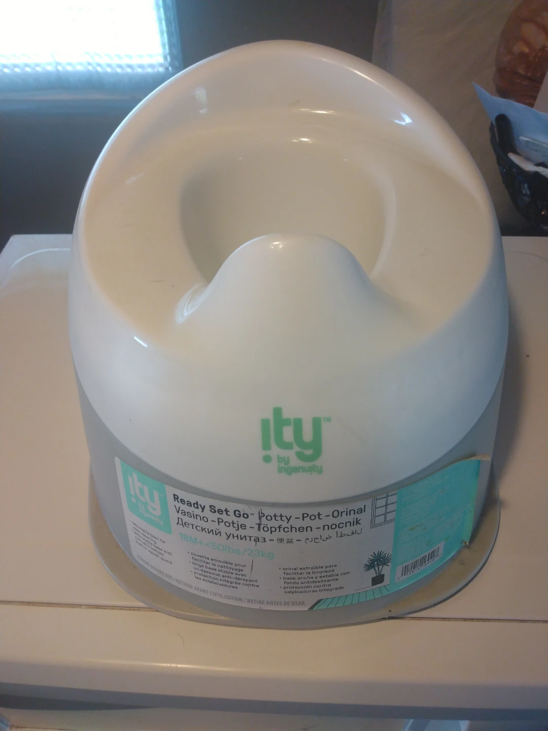 Brand New Baby Potty by Ingenuity. SE Habla Espanol