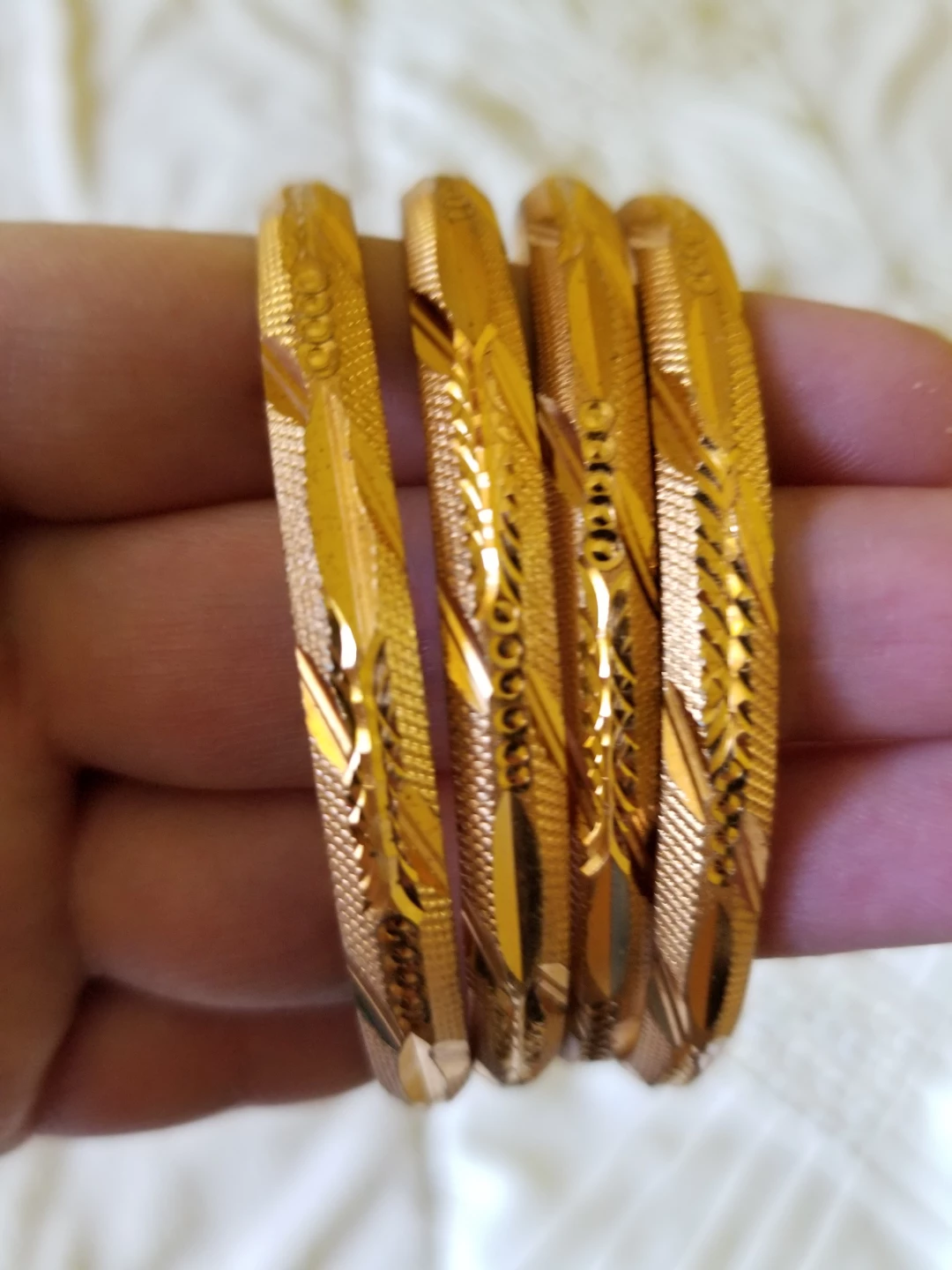 Set of 4 Gold Tone Bangle Bracelets