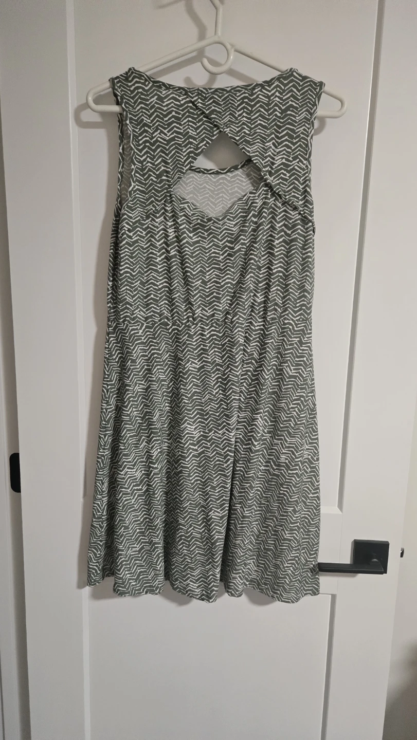 Green and white patterned sleeveless dress.