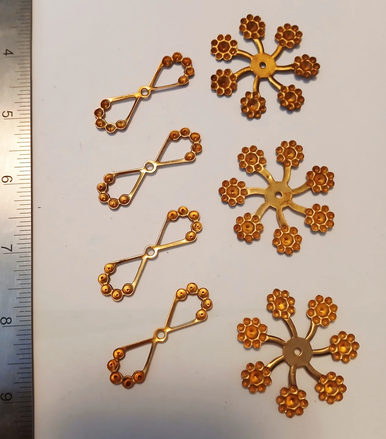 7 Brass Craft Embellishments - Snowflake & Bow Tie Shapes