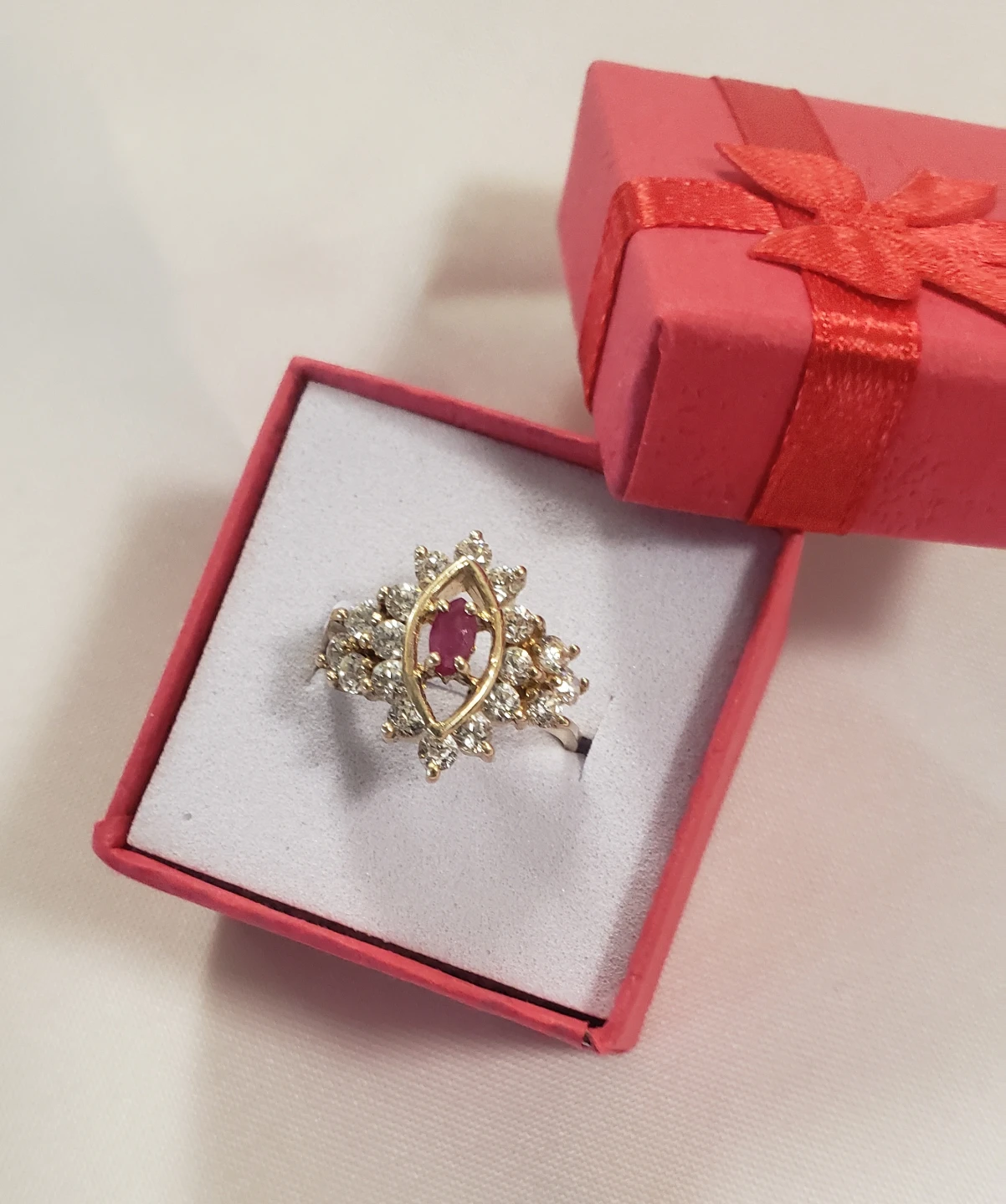 Like new 10K Real Gold W Ring With Ruby Center Stone