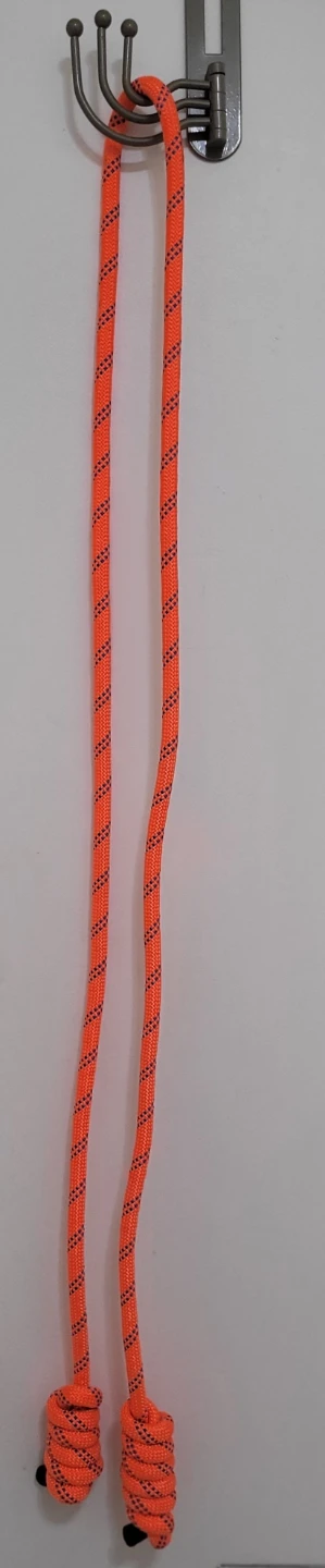 Orange rope for climbing or as a jump rope for exercising