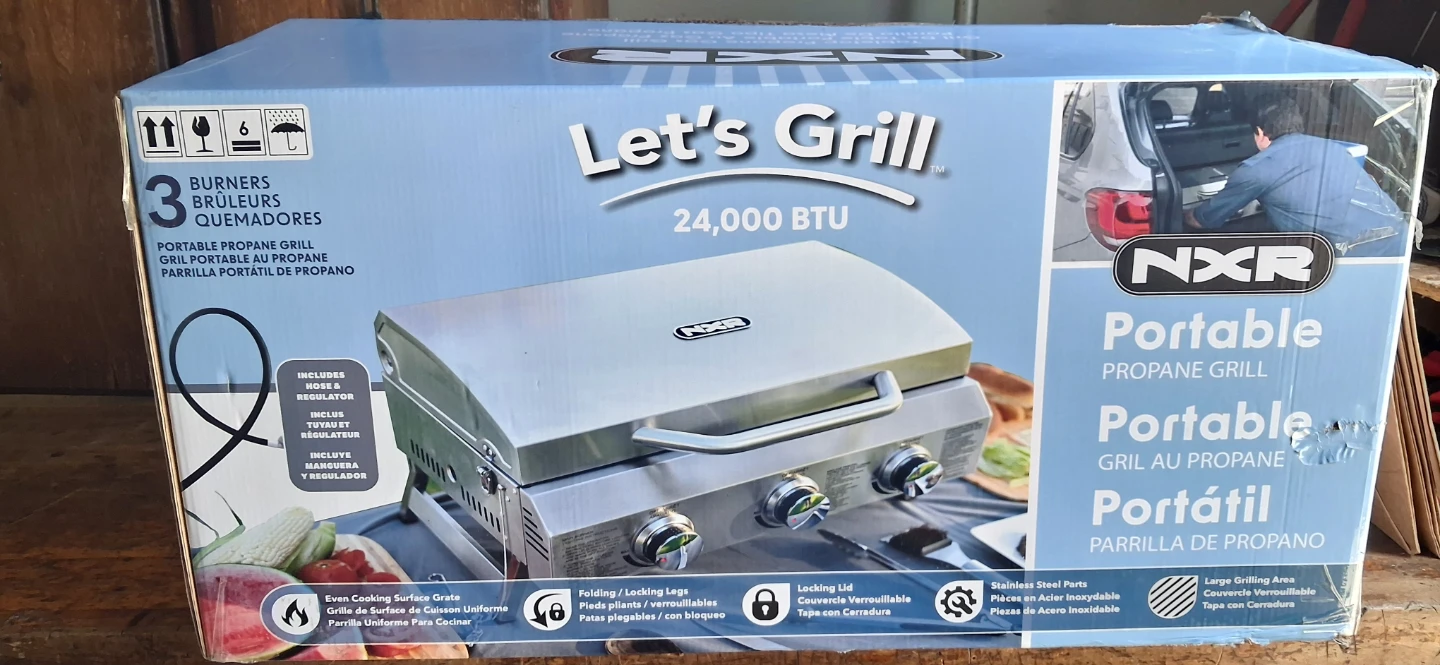 Barbecue and propane tank full Portable Propane Grill