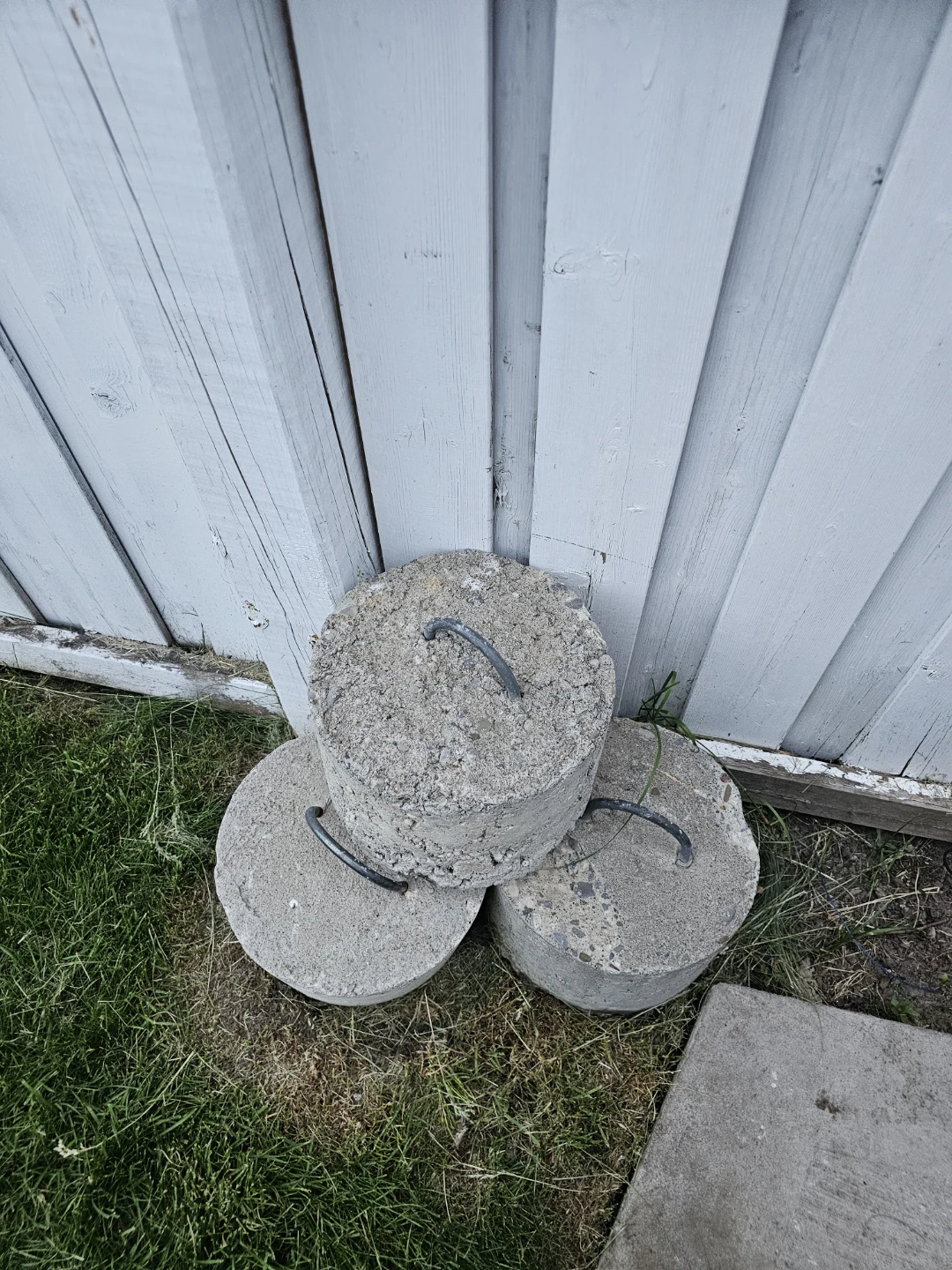 Three Concrete Anchor Blocks with Metal Loops