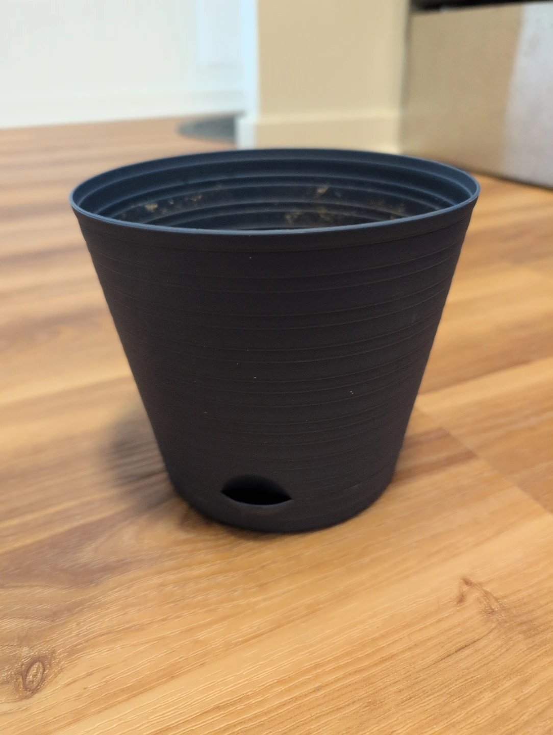 Black Plastic Plant Pot with Drainage Hole