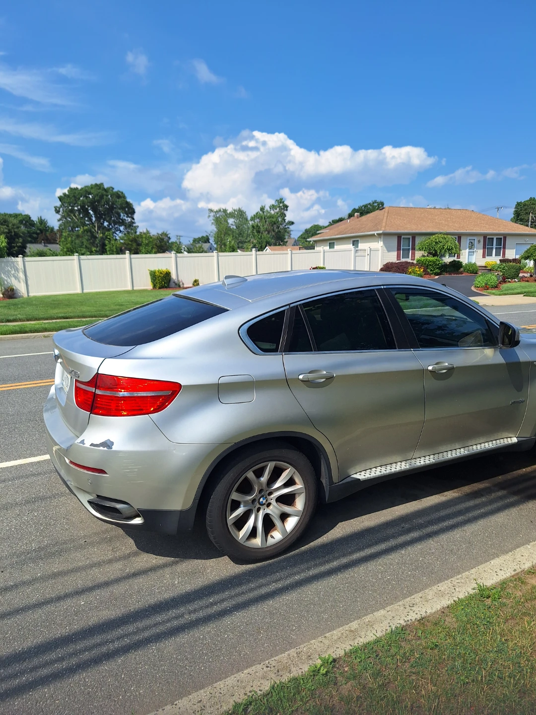 Silver BMW X6 SUV - photo 2