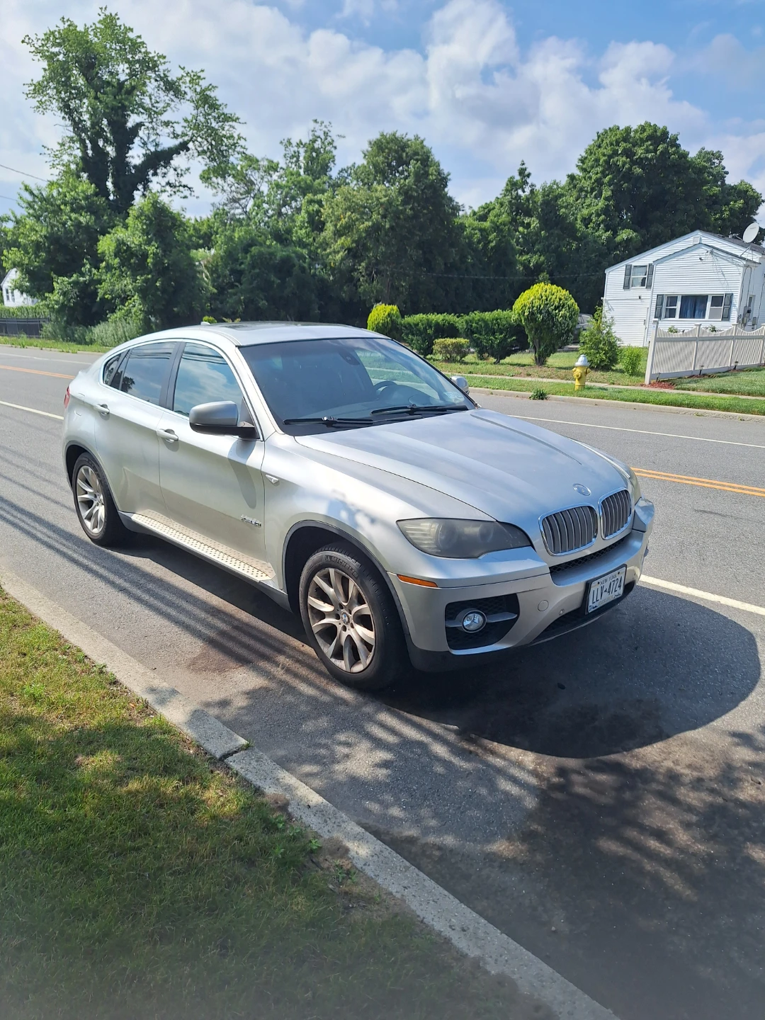 Silver BMW X6 SUV - photo 3