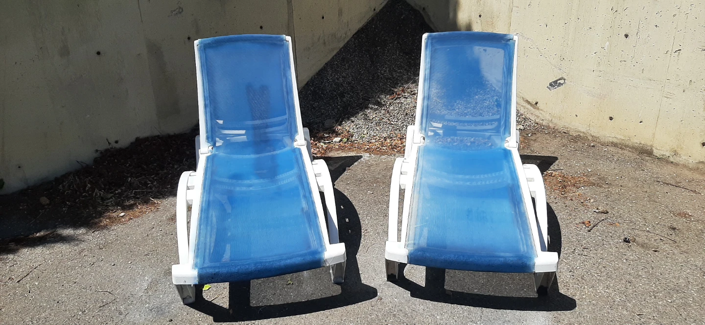 Pair Of Blue Mesh & Plastic Lounge Chairs