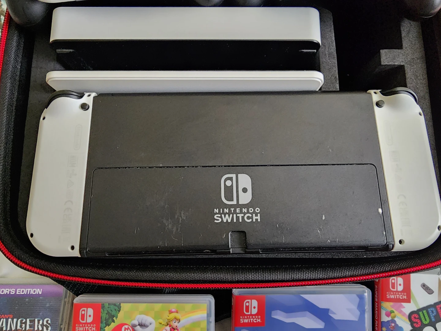 OLED Nintendo Switch Bundle with 13 Games and Accessories - photo 3
