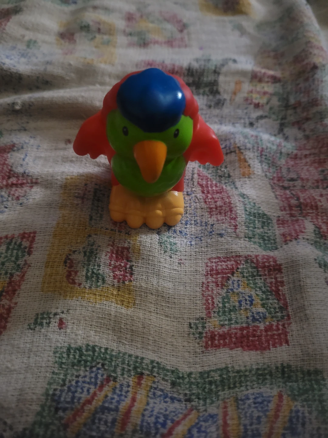 Fisher-Price Little People Parrot figure.