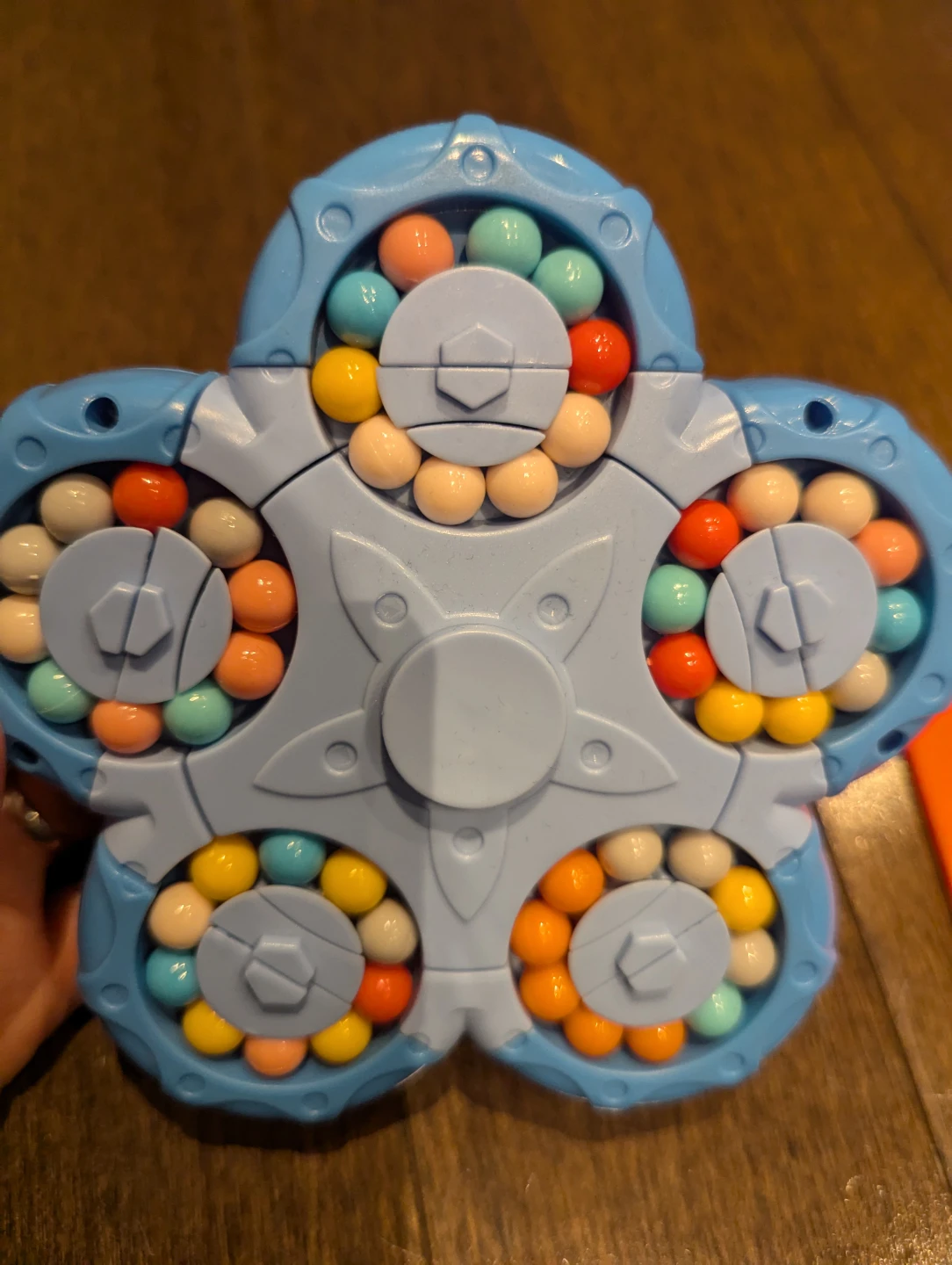 ⚽ Blue Spinner Puzzle Toy with Colorful Beads