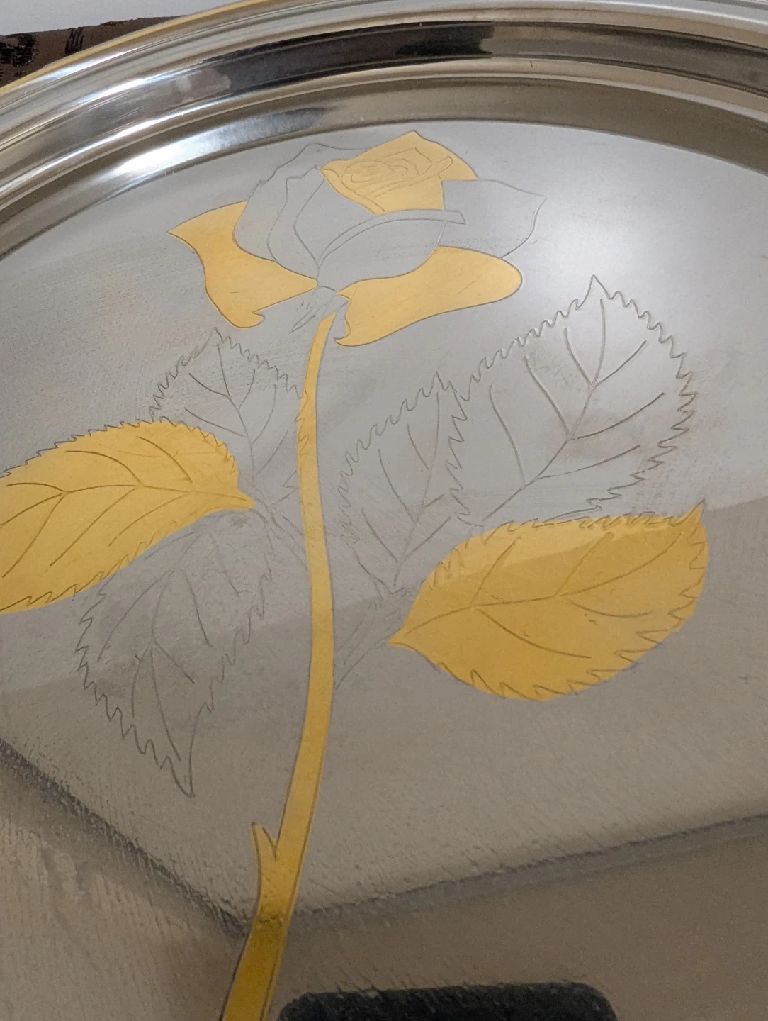 Silver-toned tray with gold rose design