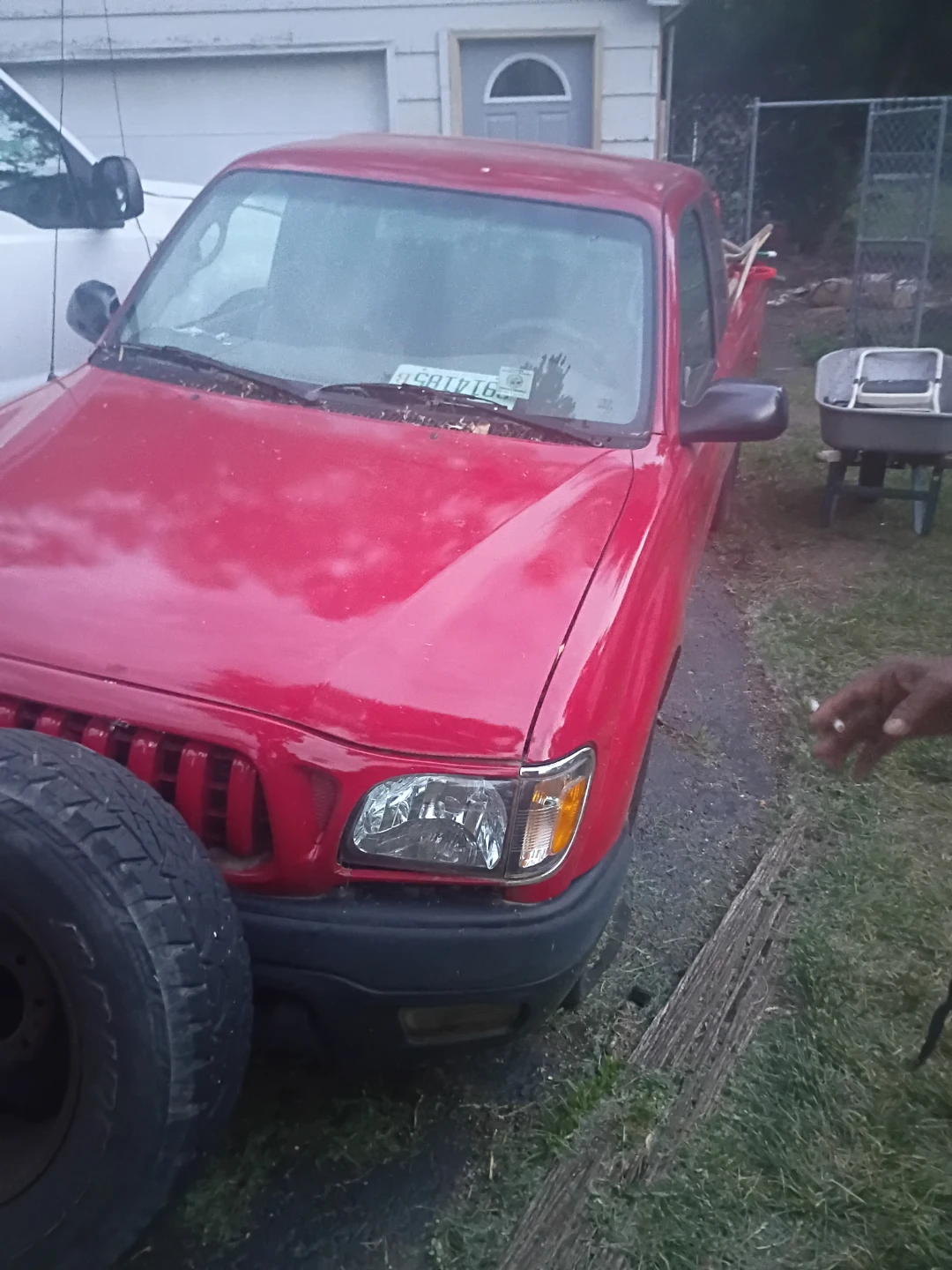 Red Toyota Tacoma Pickup Truck
