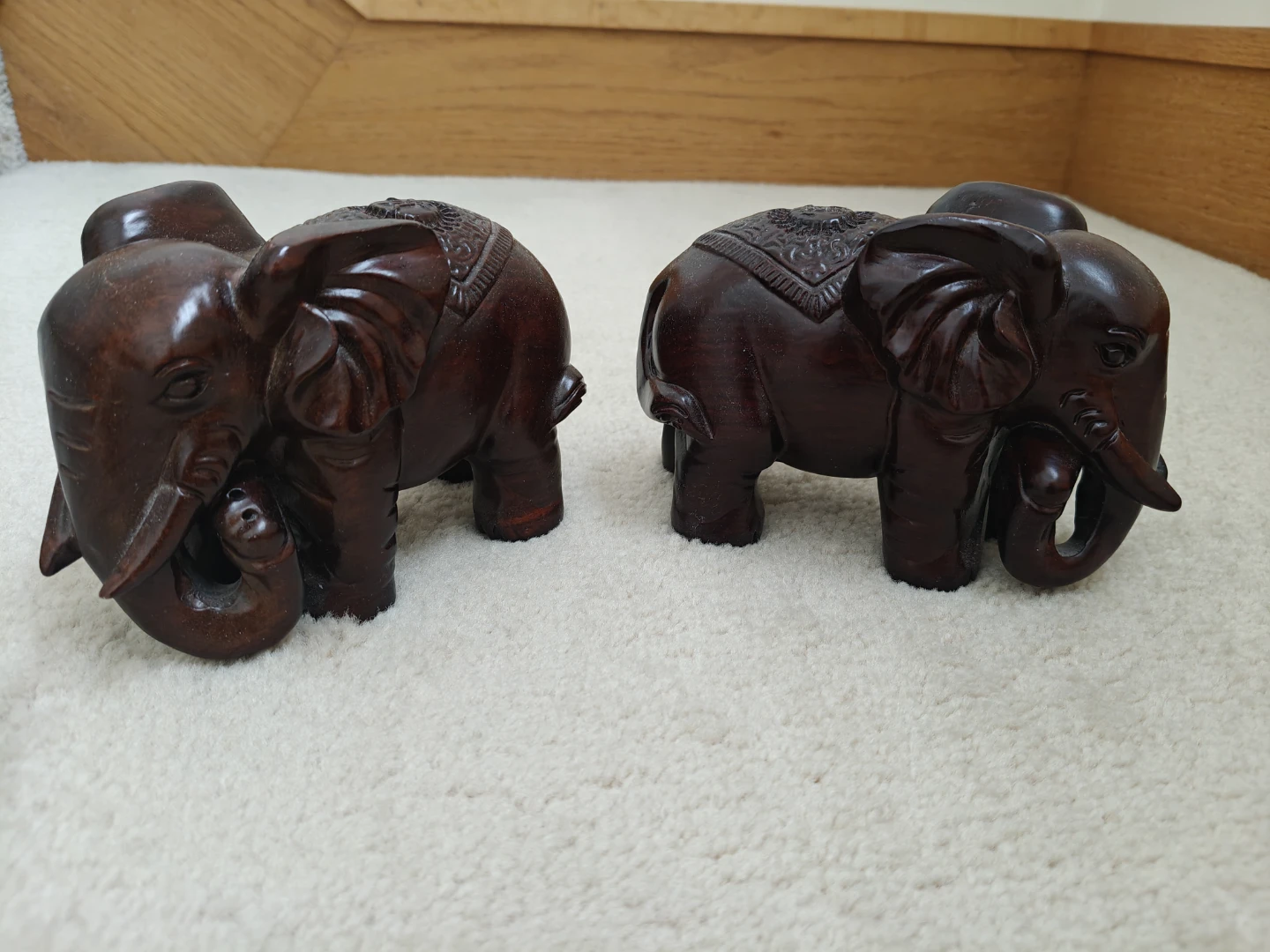 Pair of wooden elephant figurines