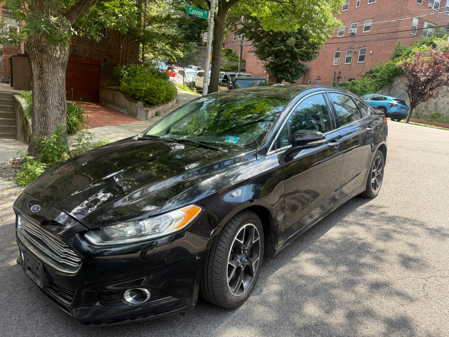 Black Ford Fusion Sedan