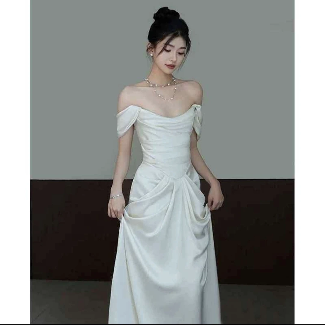 Off-the-shoulder white satin gown