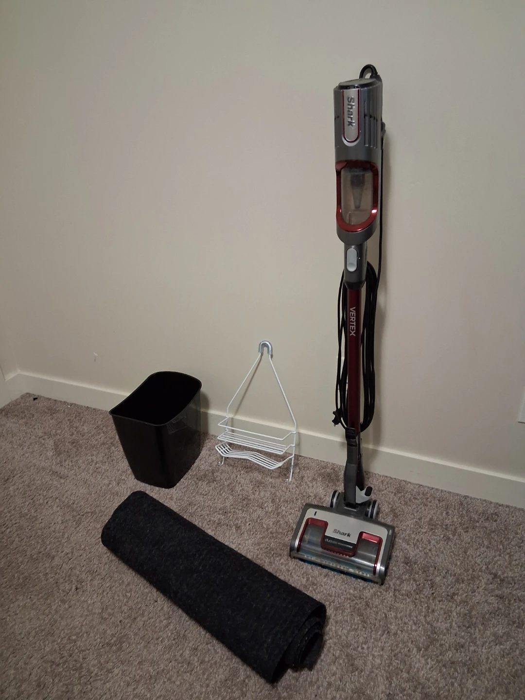 Shark Vertex Corded Stick Vacuum, trash bin, mat, hanger