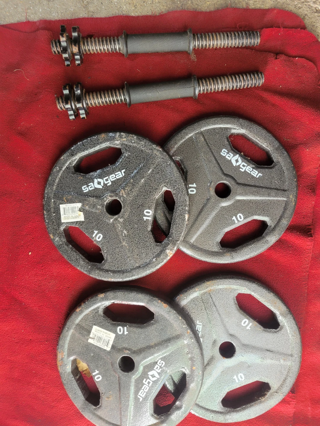 40LBs WITH DUMBBELL HANDLES. 4-10s