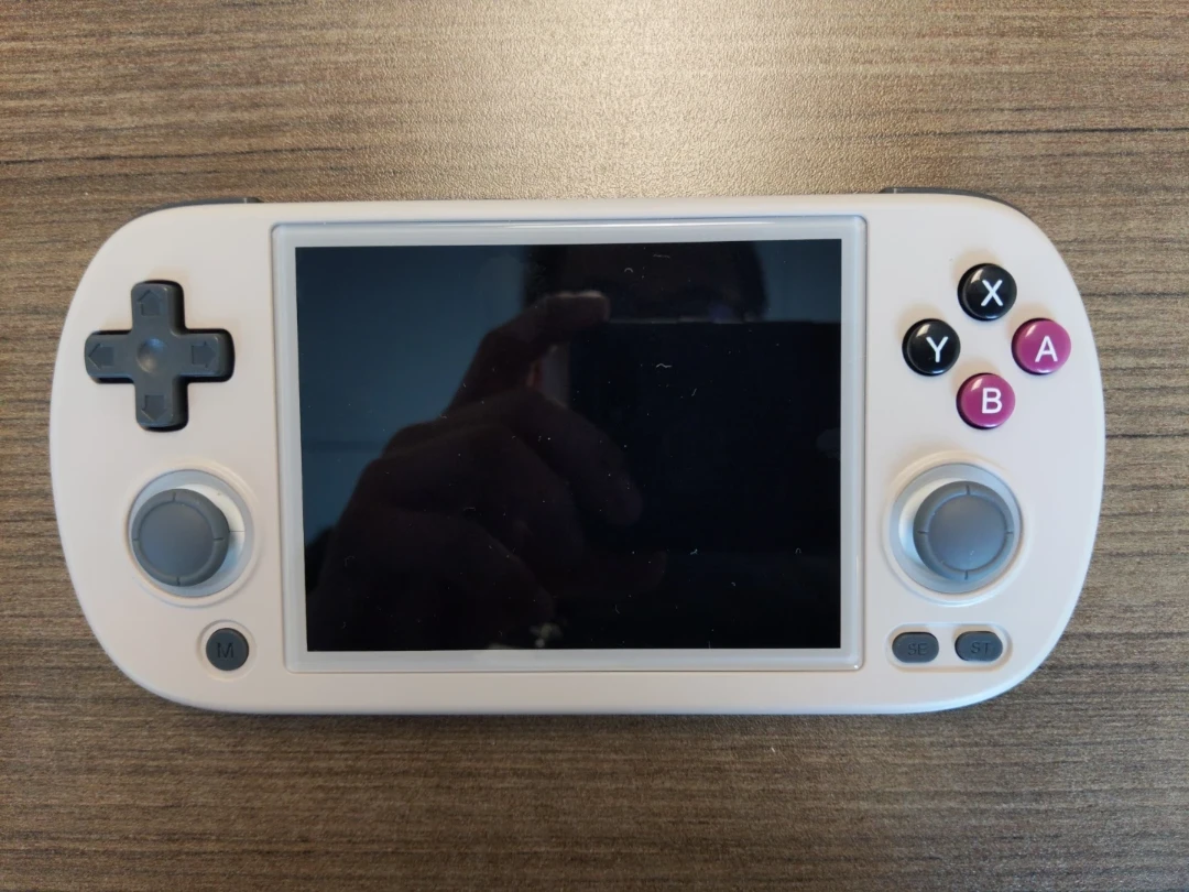 Anbernic RG40XX H handheld game console with screen protector