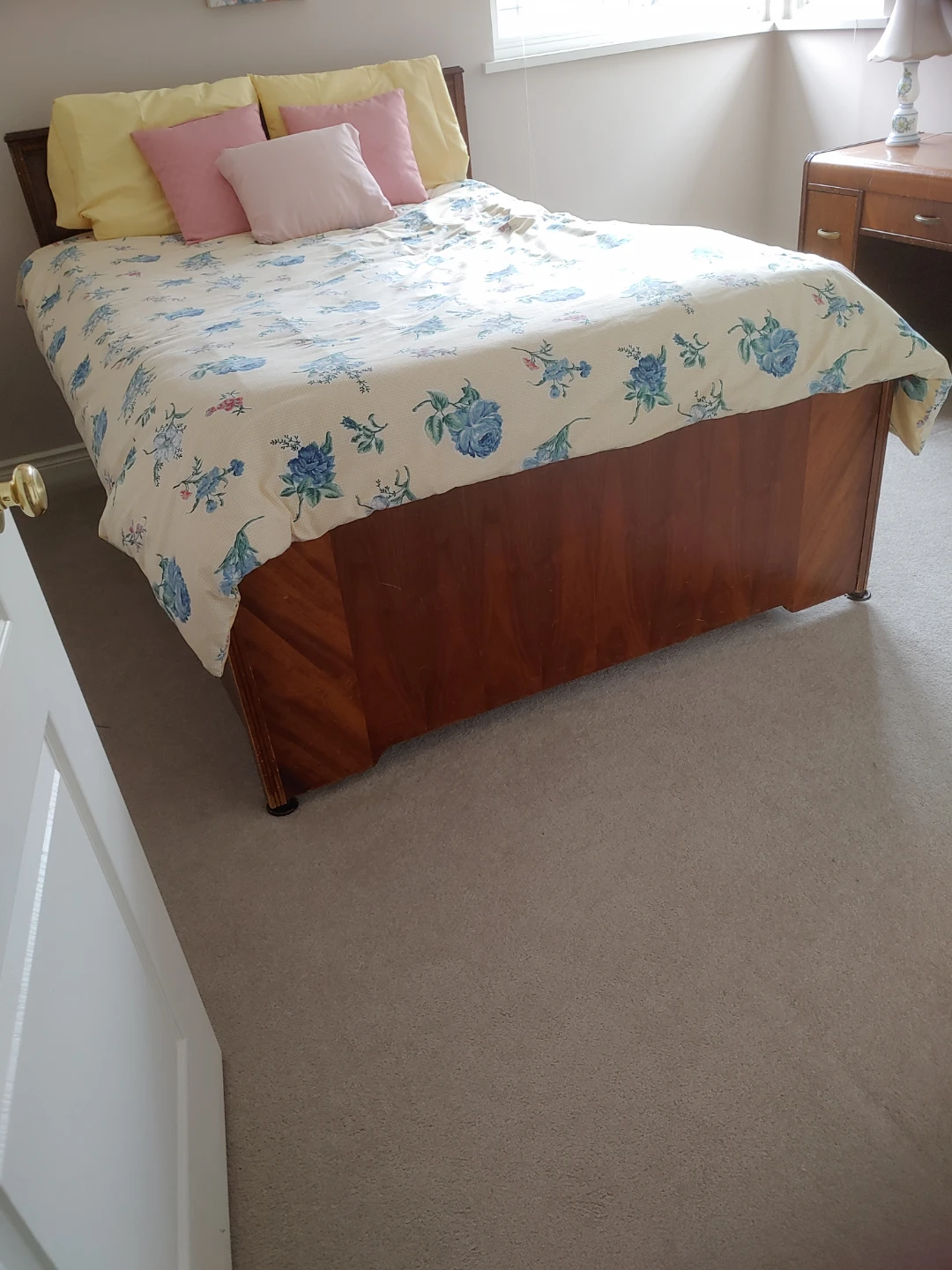 Wooden Bed Frame with Blue Floral Duvet Cover