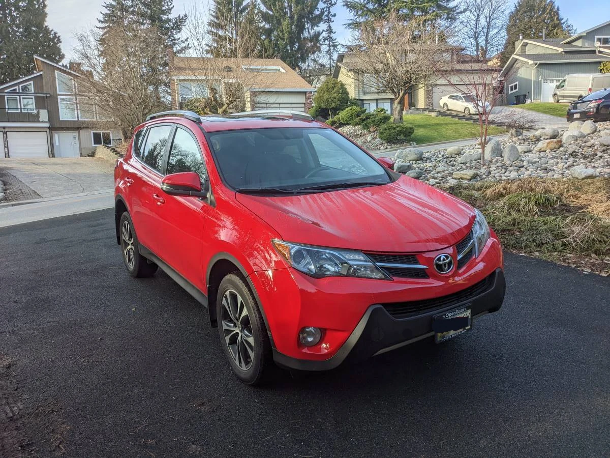 Red Toyota RAV4 XLE AWD - photo 2