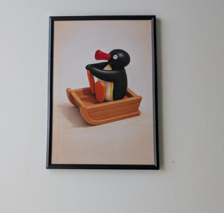 Framed Pingu on a Sled print in black frame 20x30 cm - photo 2