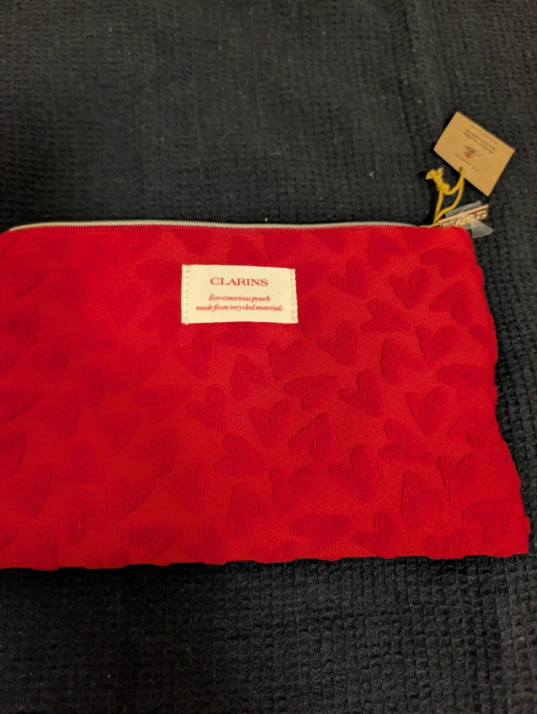 Brand new CLARINS Red Pouch/Make-up bag