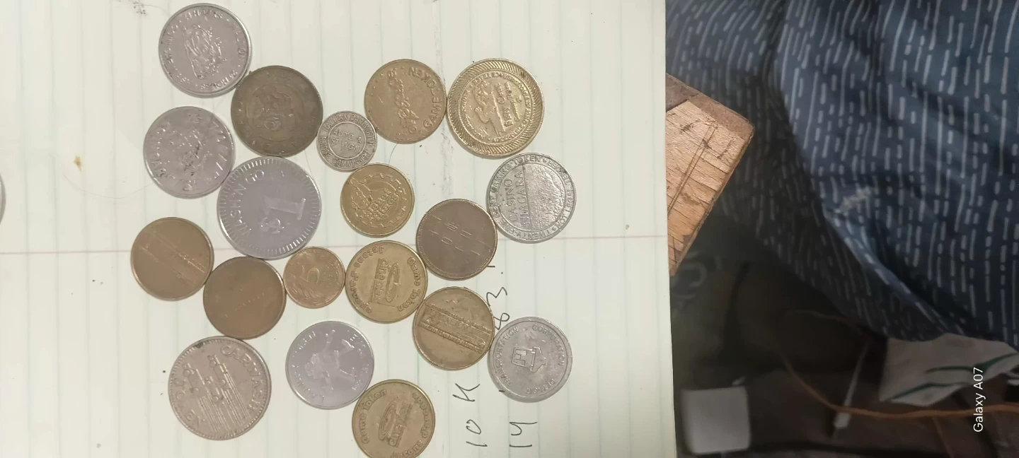 Collection of various coins and tokens