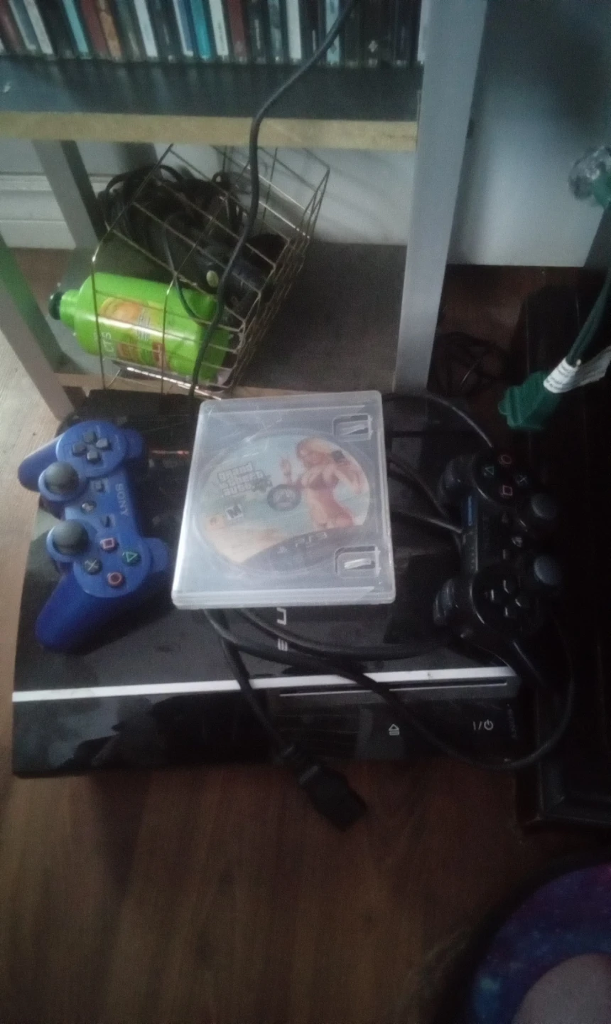 Sony PlayStation 3 Super Slim Console with Grand Theft Auto V