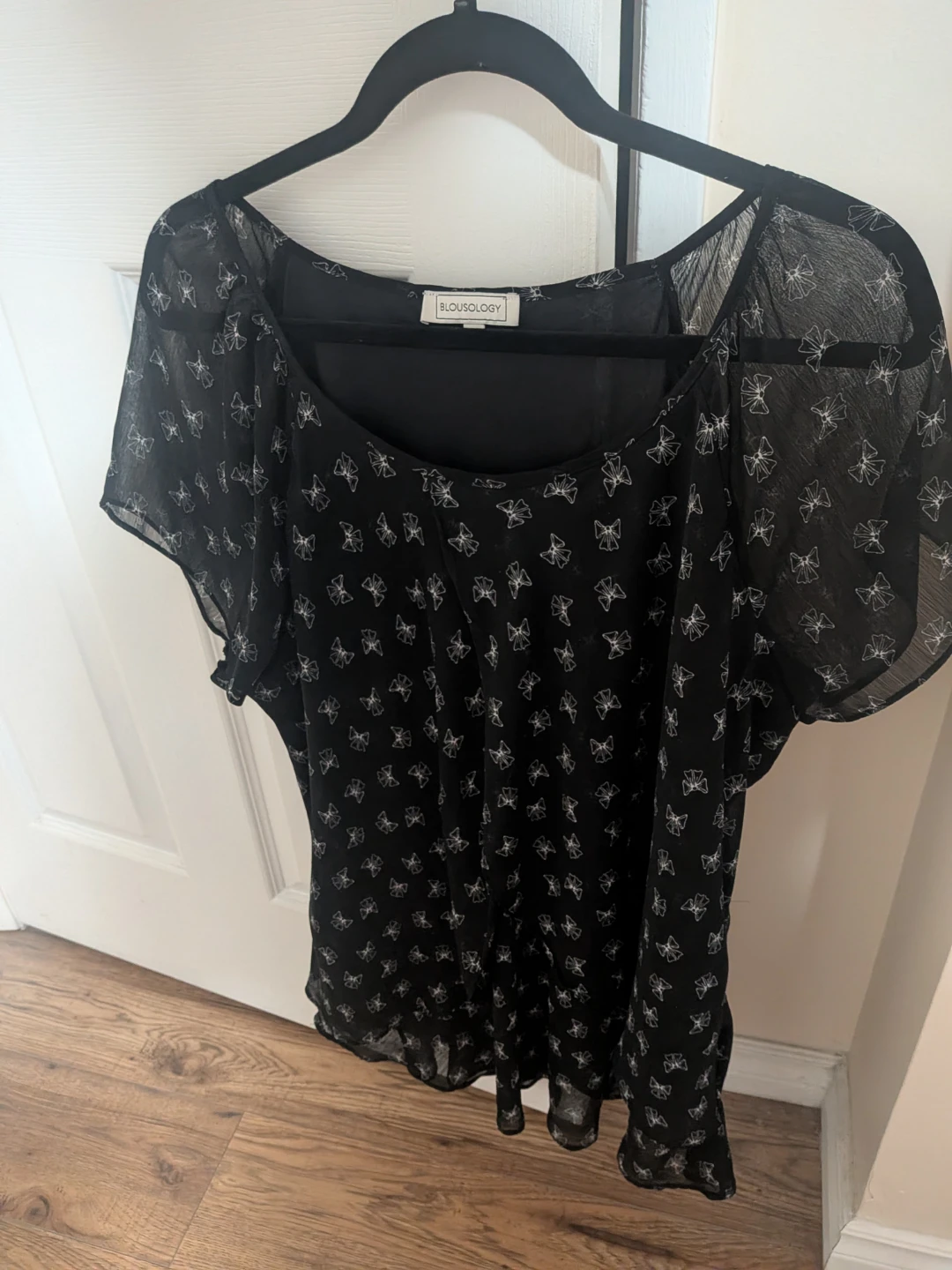 sheer black blouse pick up in St Albert