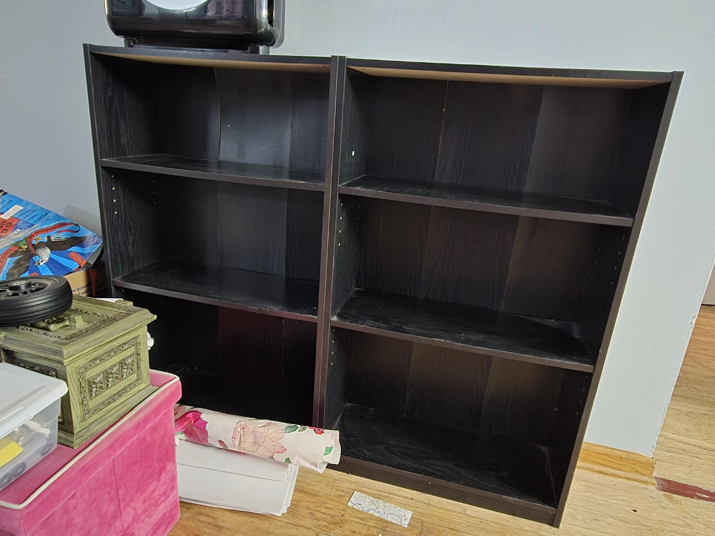 Three identical bookshelves