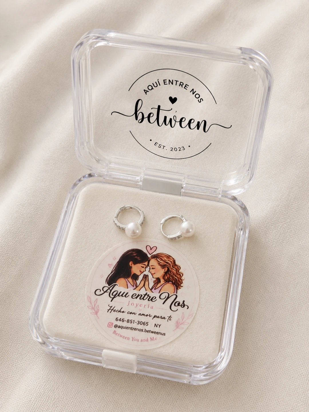 Between Earrings with Pearls .