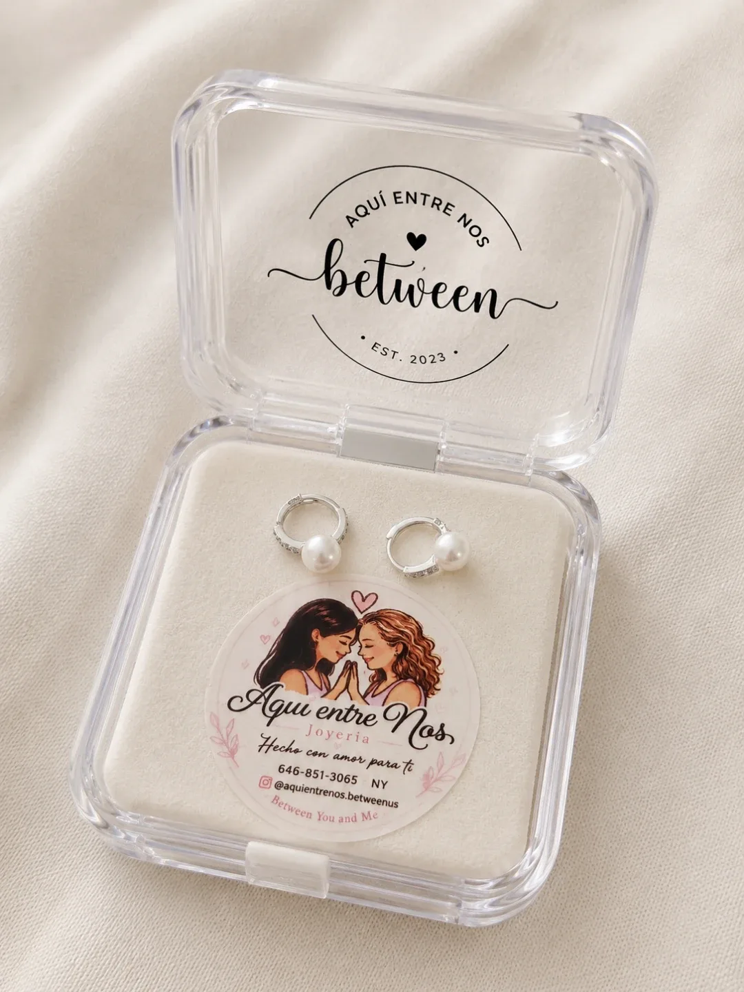 Between Earrings with Pearls .