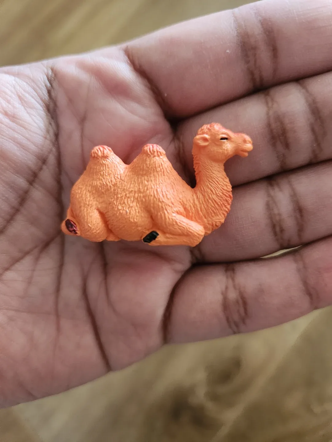 Orange Seated Camel Figurine ⚽