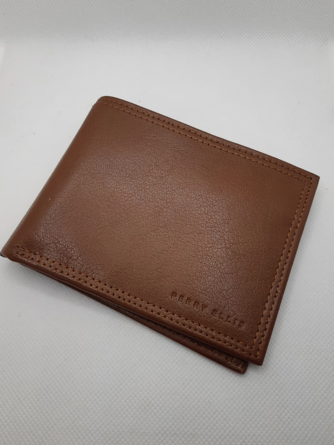 brown leather Perry Ellis bi-fold wallet