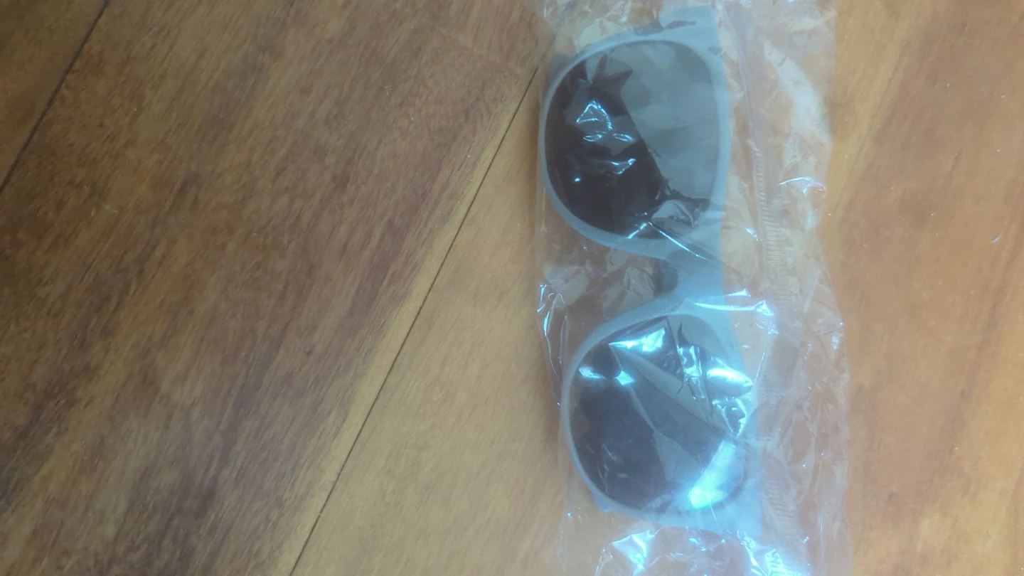 Gray plastic UV protection sunglasses in original packaging - photo 3