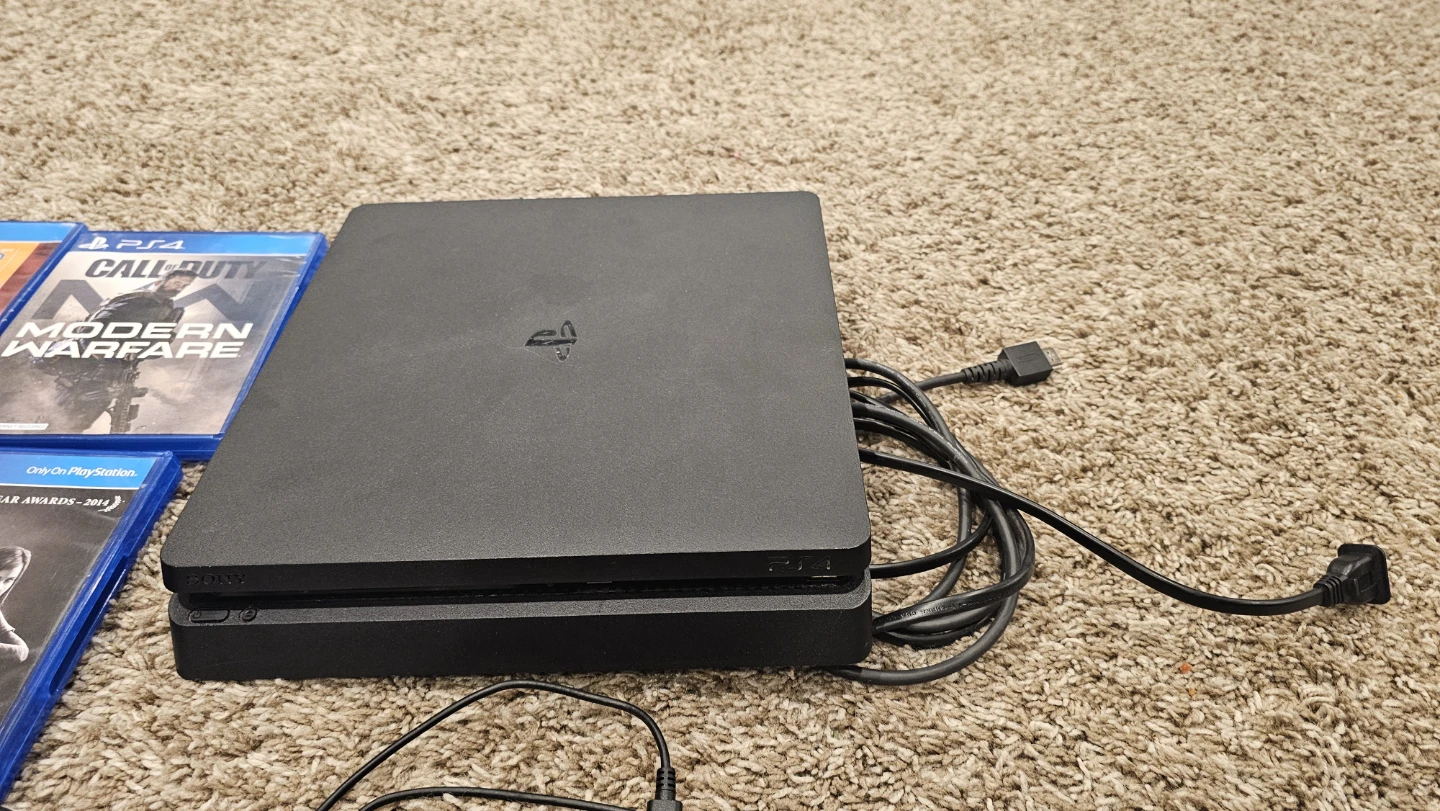 PlayStation 4, w/4 Games, 2 Controllers, & Controller Dock