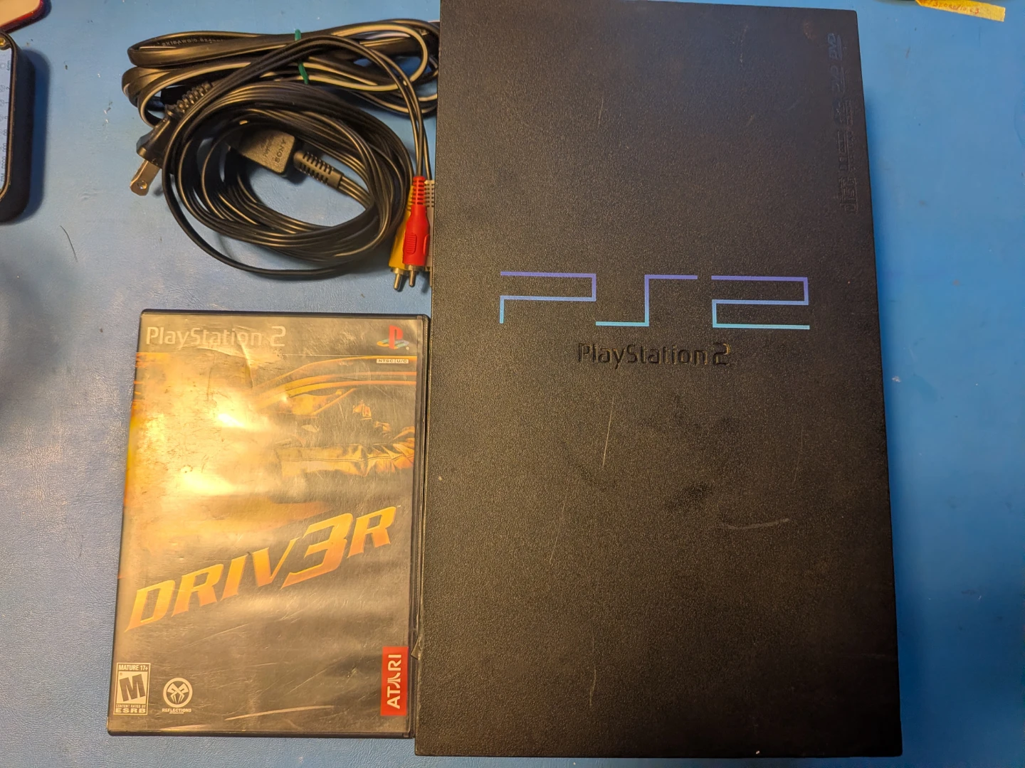 Sony Playstation 2 with game and cords
