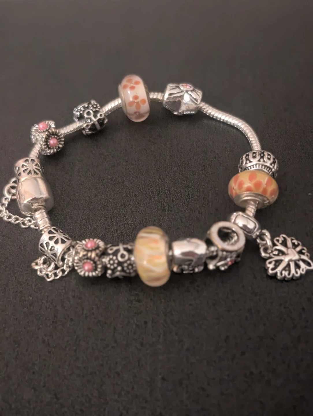 Charm Bracelet with Floral and Swirl Beads