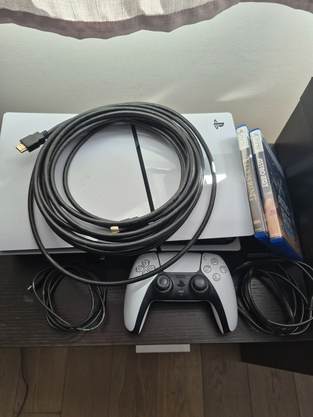 Playstation 5 Slim, controller, and 2 games
