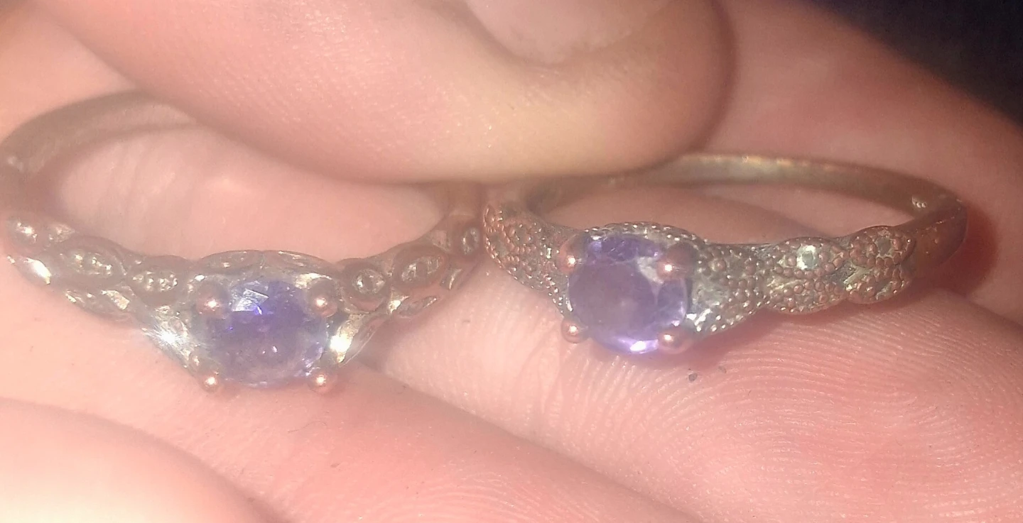 Two Twin rings with purple gemstones size 9