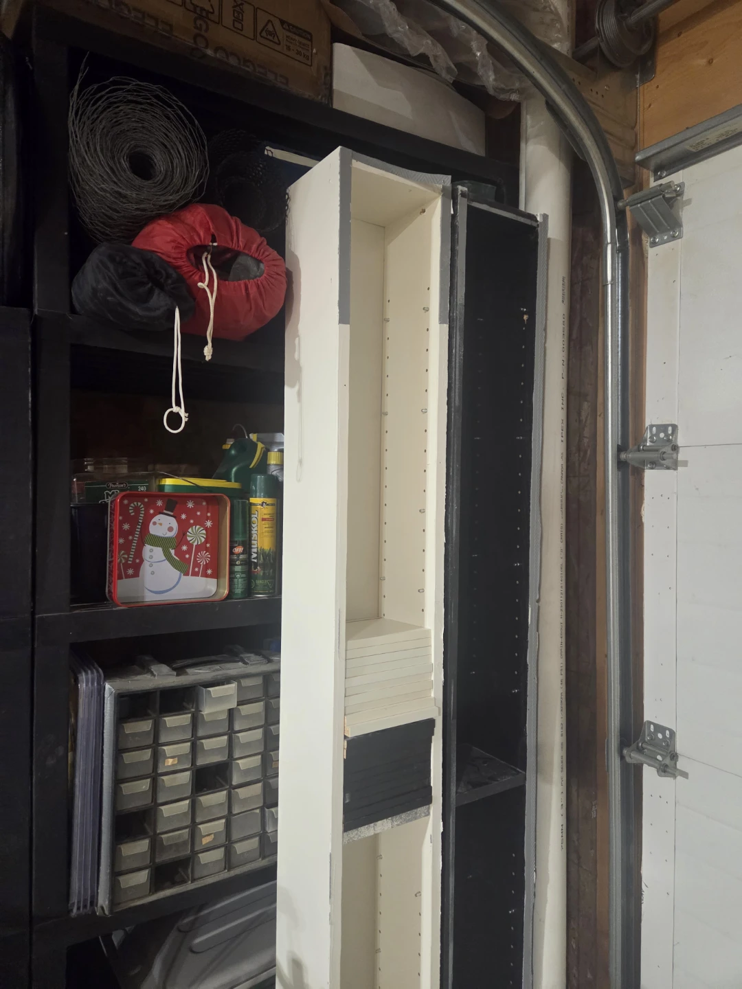 Narrow bookshelves, dvd and cd organizer.