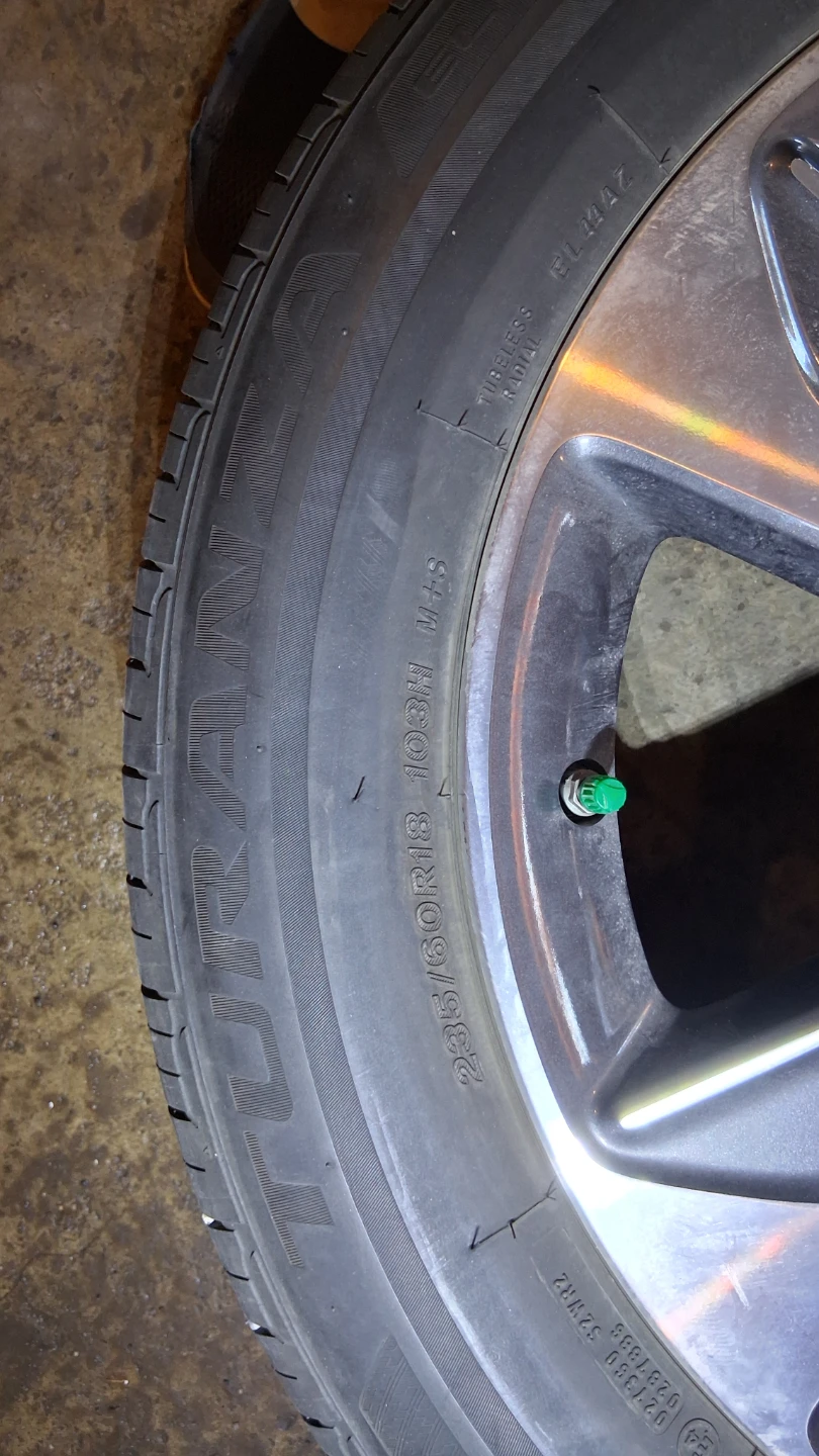 Bridgestone Tire and Rim - photo 2
